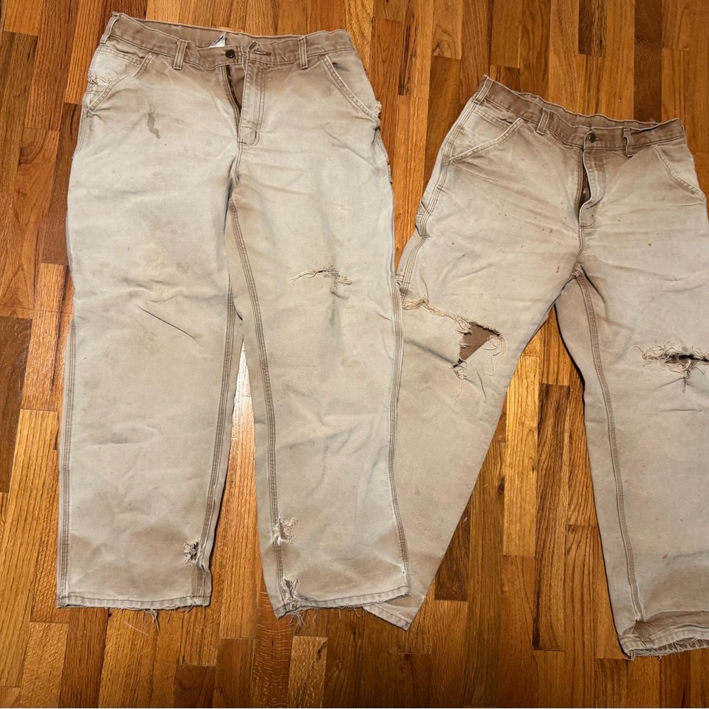 Distressed, tattered Carhartt pants